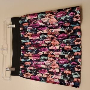 New, never worn skirt with multi colored roses